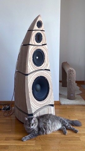 Finished Large Speaker in a living room with drivers fitted, a cat resting at its base